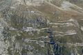 Macro lenses can be used for normal situations as well, they are excellent for landscapes. Here is the pass road of Furka in Switzerland. This is shot from the opposite side on the Grimsel pass road several kilometers away using a Sigma 150