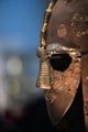 Mask of Sutton Hoo in British Museum, London. This is handheld and through the display case. One interesting bit about taking pictures in museums is that if the object is behind a glass case, you will want to come closer to the glass to reduce the reflections. At this time you will be quite close to the object itself, so being able to focus close is a plus. In most cases a regular zoom would be able to get a similar reproduction ratio but the lens would be further away from the camera which makes it harder to hide the reflections. In this particular case, note that the mask here will fit an average person so is about 20-25cm high, so the reproduction ratio is more like 0.2x which most practical lenses would manage easily.